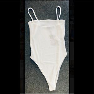 BOOHOO. WHITE NEVER WORN BODYSUIT